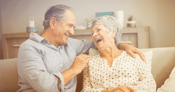 older couple on a couch 